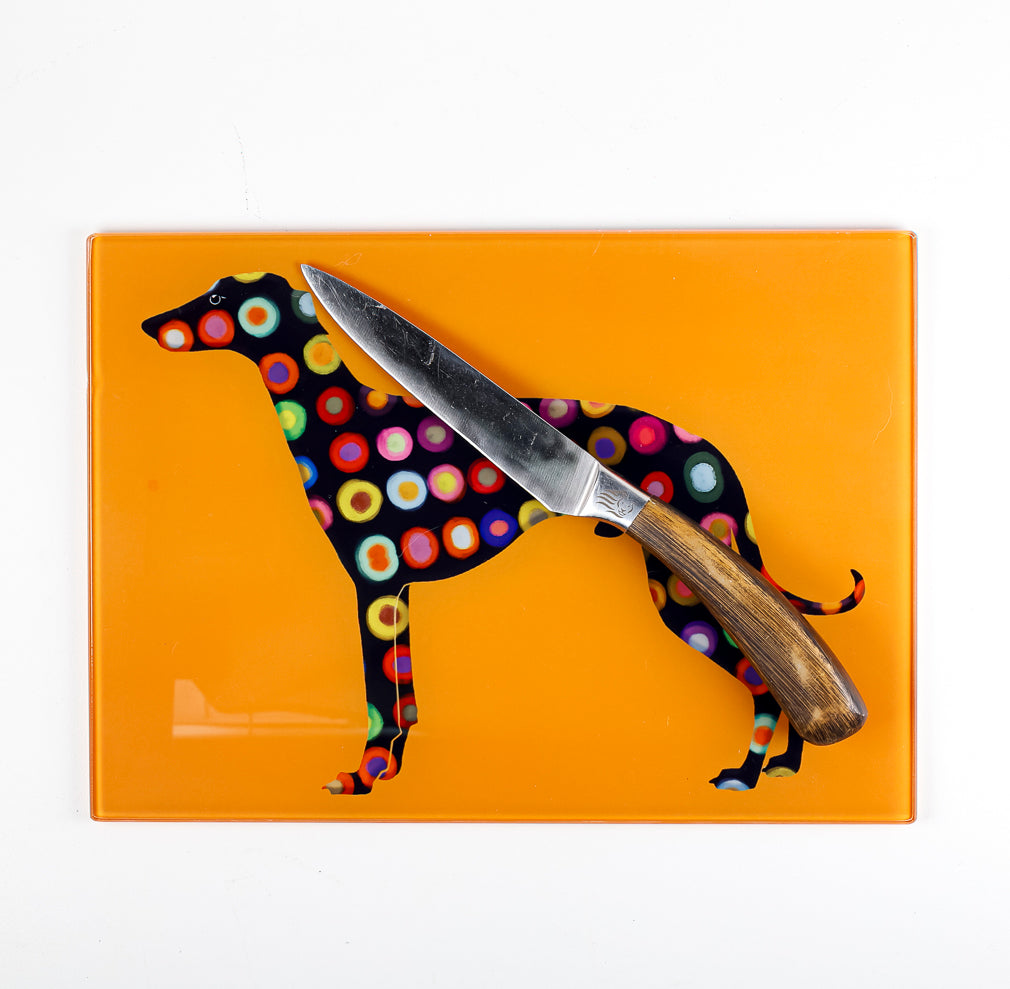 SALE - Spotty Greyhound Small Rectangular Worktop Protector on bright orange