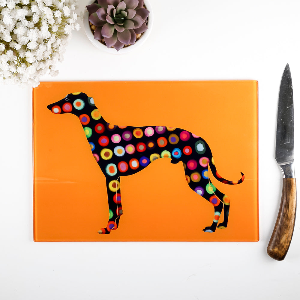 SALE - Spotty Greyhound Small Rectangular Worktop Protector on bright orange