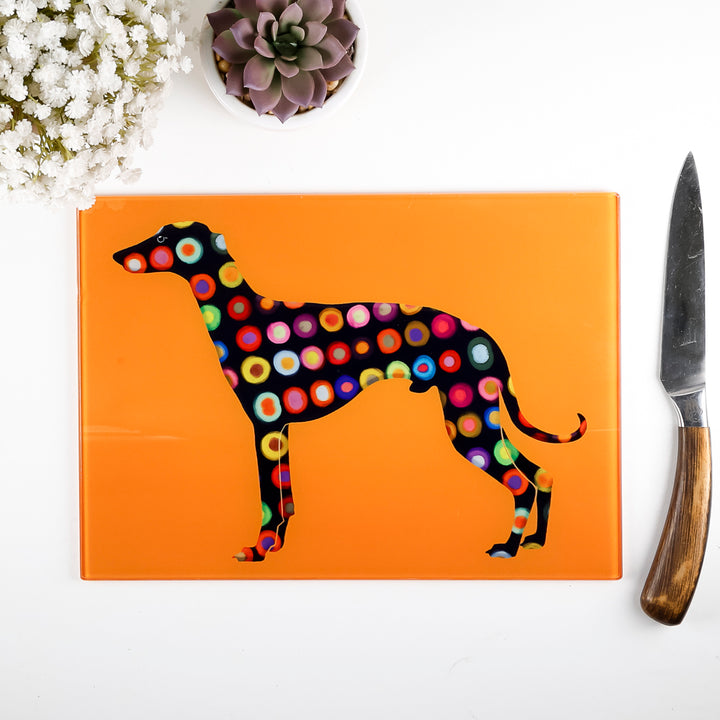 SALE - Spotty Greyhound Small Rectangular Worktop Protector on bright orange