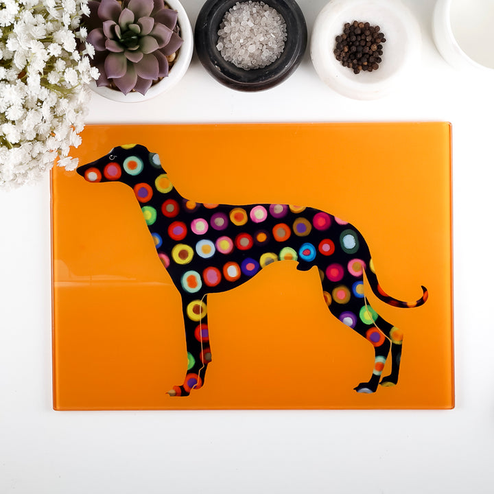 SALE - Spotty Greyhound Small Rectangular Worktop Protector on bright orange