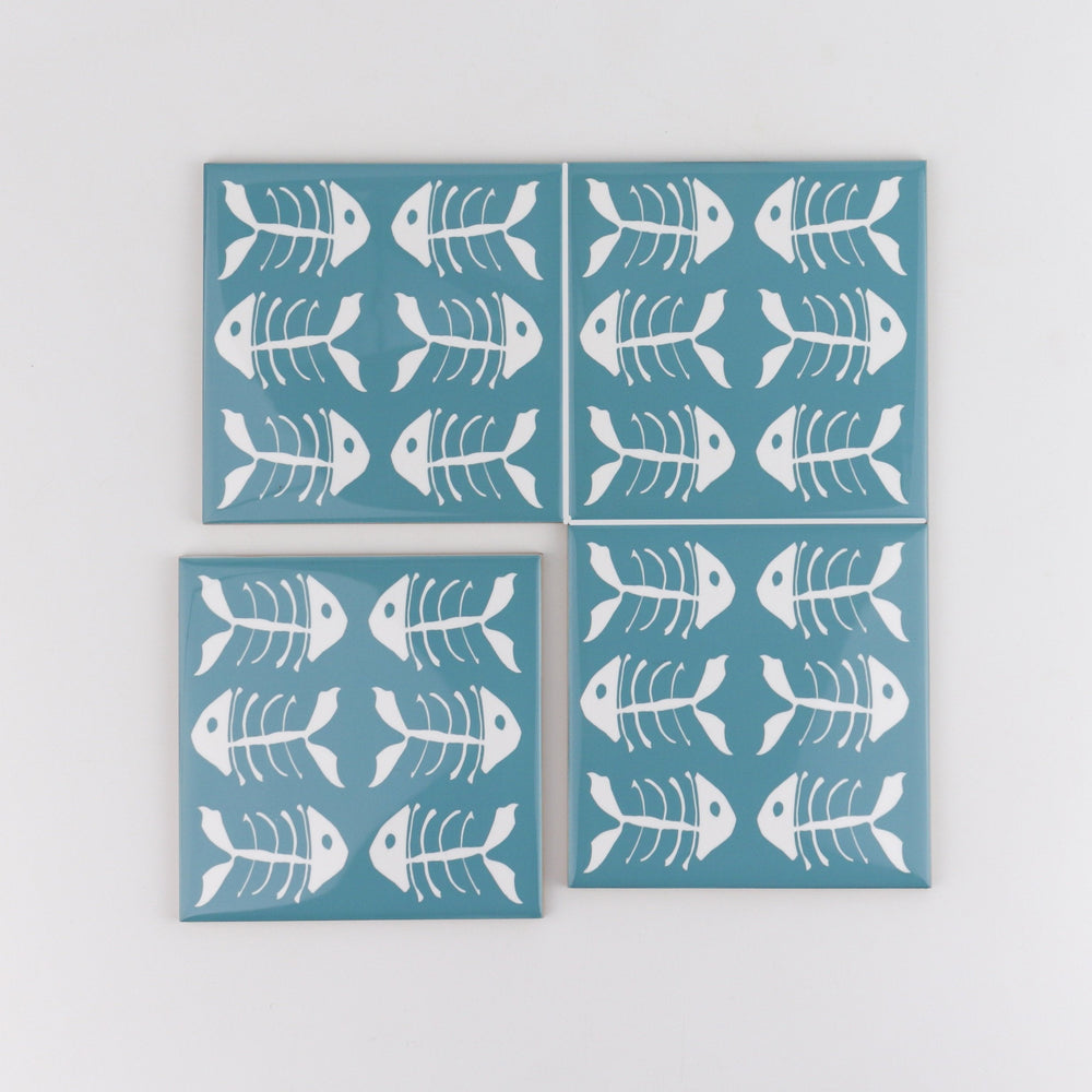 Rich blue kitchen tiles, funky bone fish design