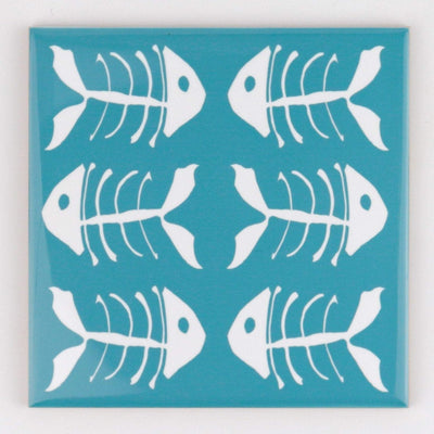 Rich blue kitchen tiles, funky bone fish design