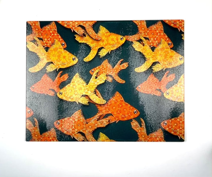 Goldfish on Dark Grey Cutting Board / Heatproof Pan Rest