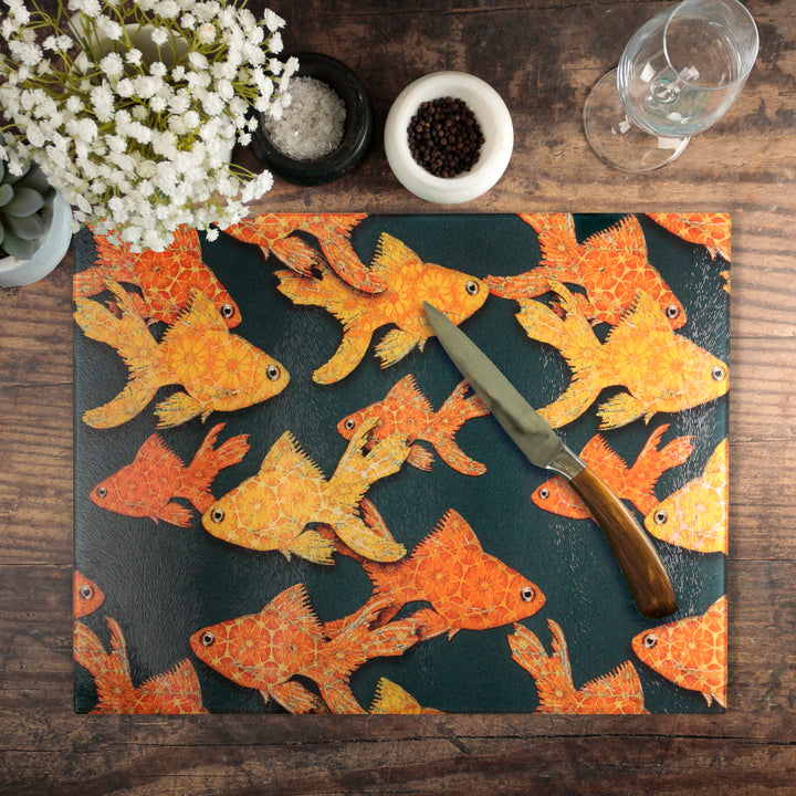 Goldfish on Dark Grey Cutting Board / Heatproof Pan Rest