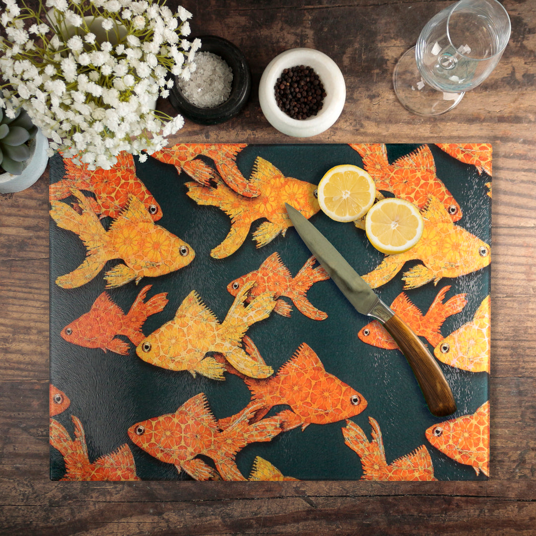 Goldfish on Dark Grey Cutting Board / Heatproof Pan Rest