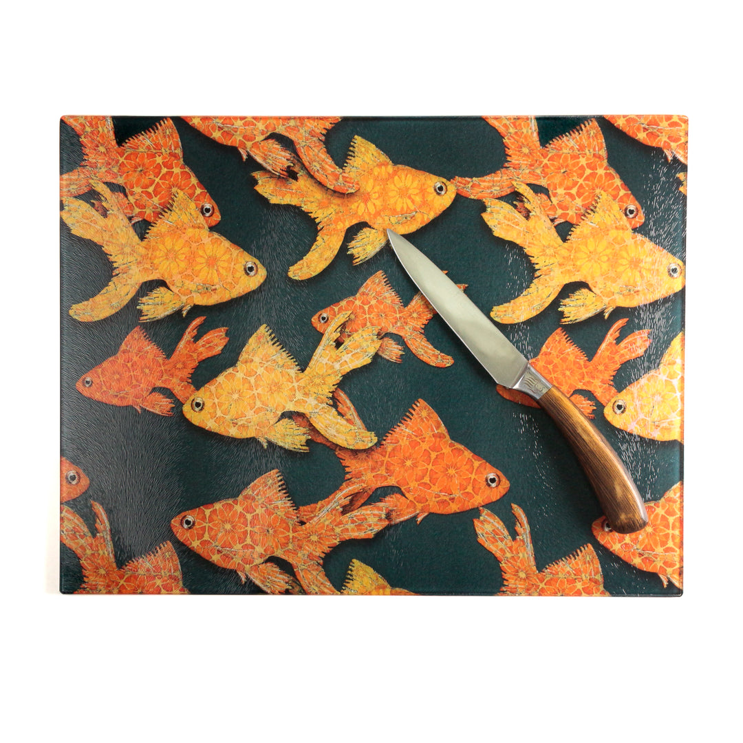 Goldfish on Dark Grey Cutting Board / Heatproof Pan Rest