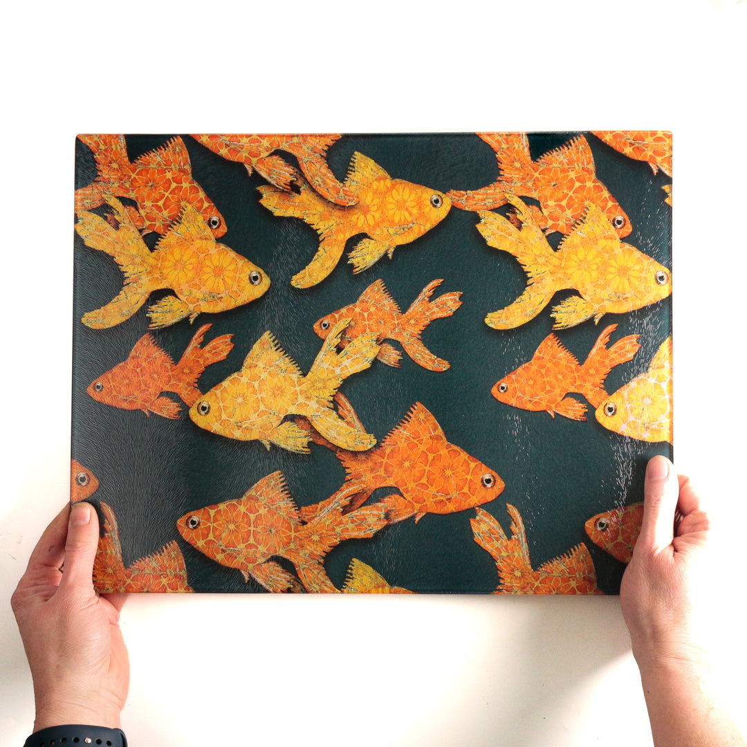 Goldfish on Dark Grey Cutting Board / Heatproof Pan Rest